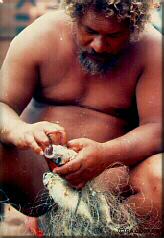 Photo - Hawaiian fisherman with his net & catch, Molokai, Hawaii